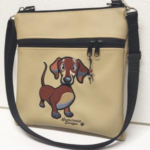 Hímzett tacskó kutya textilbőr táska övtáska 25x25