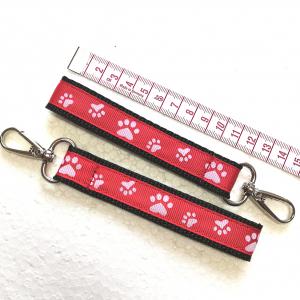 Tappancsos heveder kulcstartó táskadísz karabinerrel piros