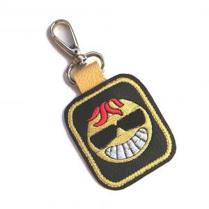 Vigyorgó smiley hímzett bőrkulcstartó kulcsdísz táskadísz